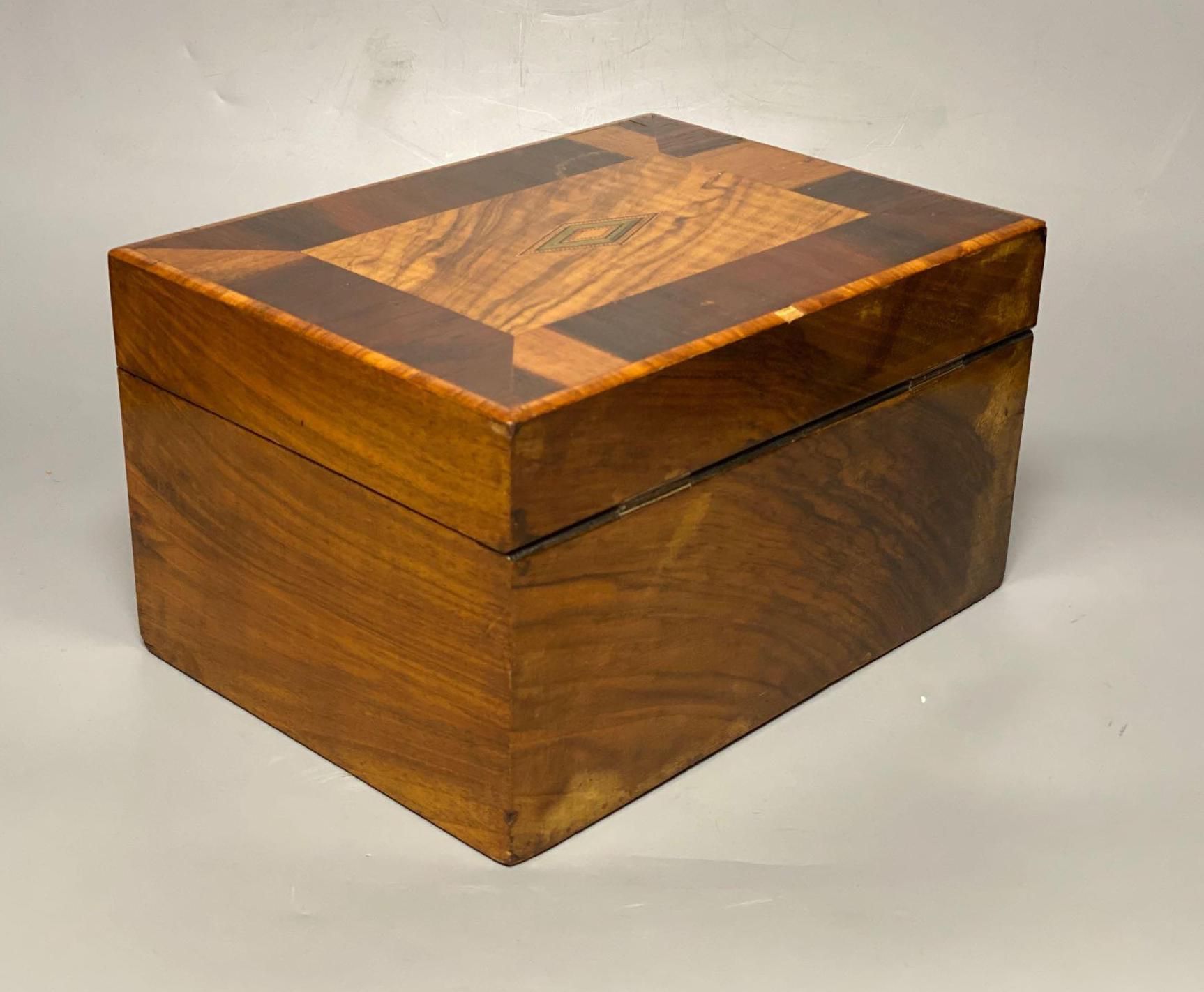 A Victorian crossbanded parquetry work box, 28cm and a rosewood writing slope